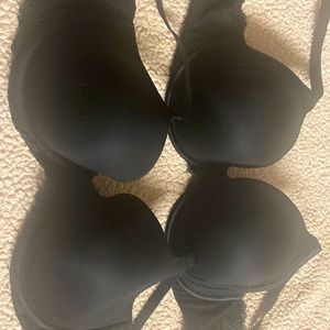 2 Black Spanx Bras 38D in very good used condition.no refunds